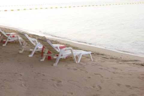 Chair on the beach Stock Photos
