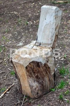 Chair carved from wood handmade Stock Photos