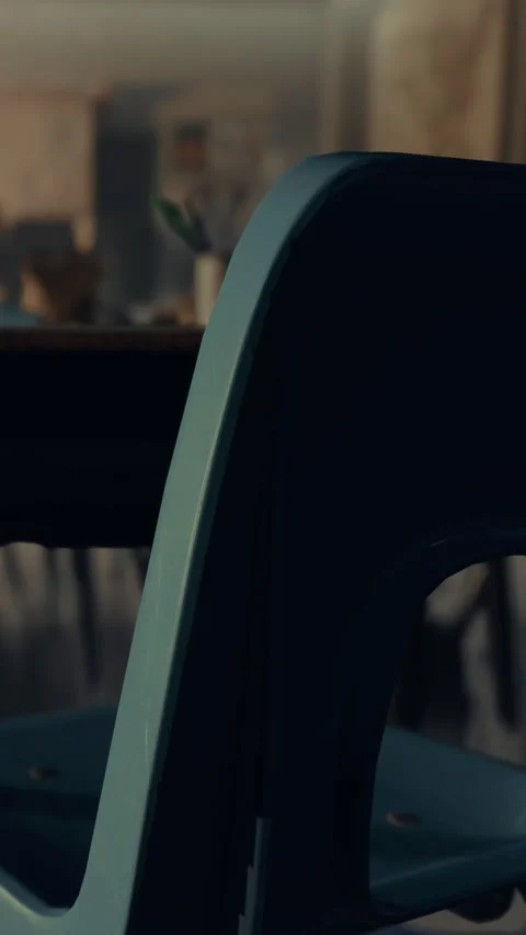 Chair in classroom setting with desk and school supplies visible in background Stock Footage 335688889
