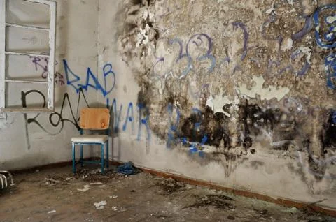 Chair in decayed room Stock-Fotos