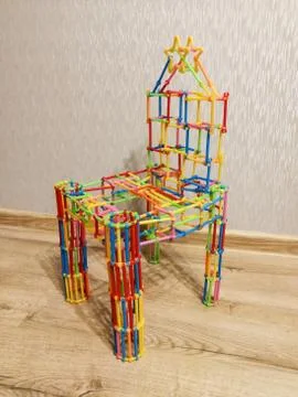 Chair design made from child constructor Stock Photos