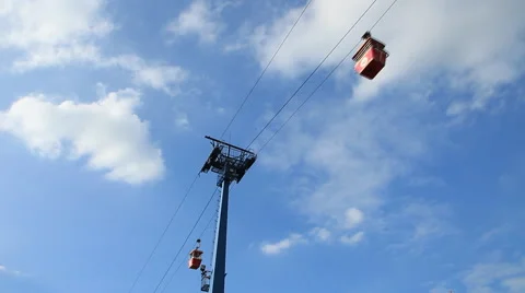 Chair lift under moving clouds bluesky Stock Footage 40857540