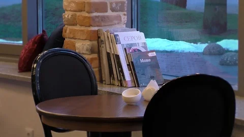 A chair sitting in front of a window Stock Footage 129578638