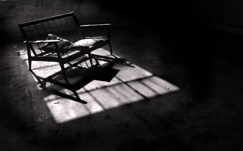 Chair in sunlight Stock Photos