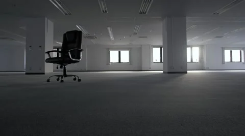 Chair turning around in empty office space Stock Footage 59789458
