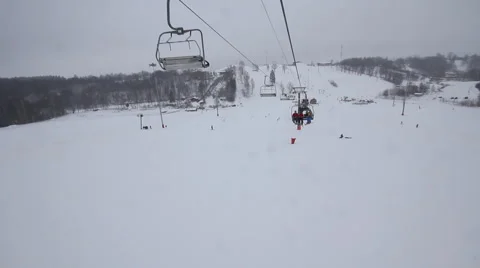 Chairlift in the mountains Stock Footage 1060431