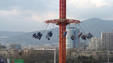A Chairoplane in Teharn Stock Footage 336184034