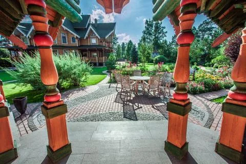 Chairs and table on terrace Stock Photos