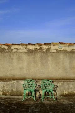 Chairs and Wall Stock Photos