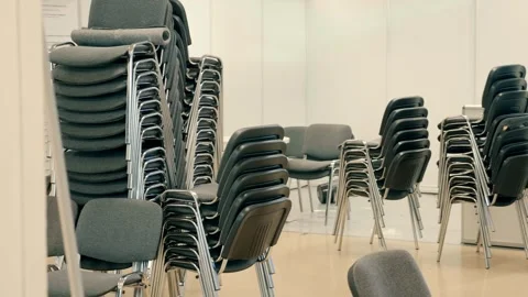 Chairs are stacked on top of each other to save space Stock Footage 333362626
