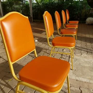 Chairs arranged for the queue of visitors Stock Photos