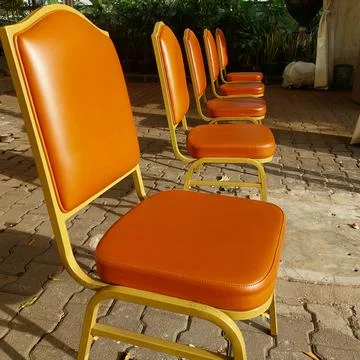 Chairs arranged for the queue of visitors Stock Photos