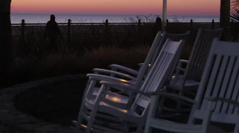 Chairs on a Boardwalk - Dawn Stock Footage 46699189