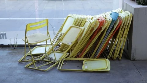 Chairs Chained Up at Empty Restaurant COVID 19 Coronavirus Stock Footage 129349871