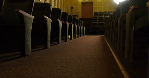 Chairs in the dark empty theater hall Stock Footage 158451170