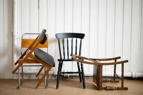 Chairs in Disarray: A Collection of Mismatched Chairs Stock Photos