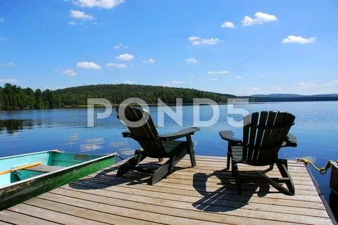 Chairs on dock Stock Photos