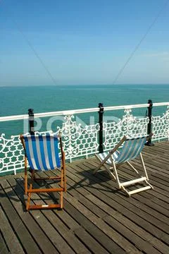 Chairs on dock Stock Photos