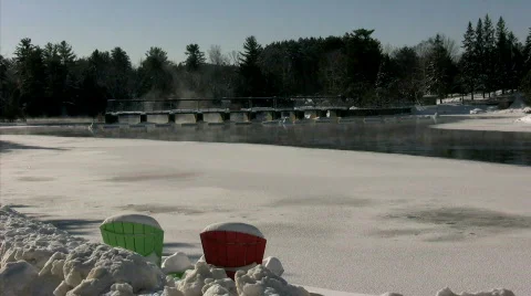 Chairs on misty winter river Stock Footage 309888