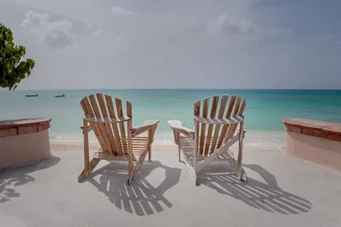 Chairs overlooking the ocean Fotos de archivo