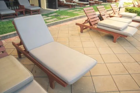 Chairs on a pool deck Foto stock
