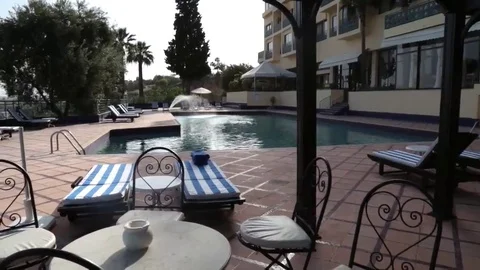 Chairs by the pool Stock Footage 69109595