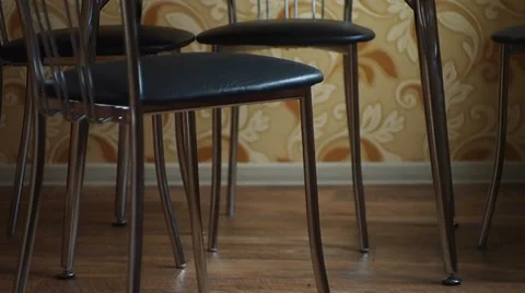 Chairs put under the table Stock Footage 35279469