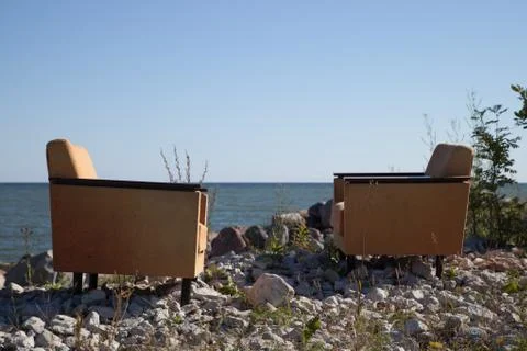 Chairs on the seashore Foto stock