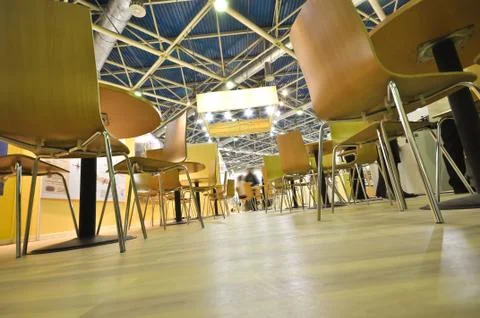 Chairs stand on the floor Stock Photos