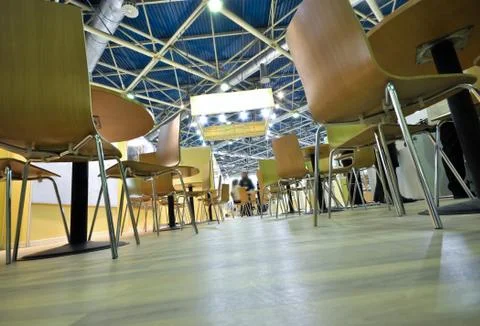Chairs stand on the floor Stock Photos