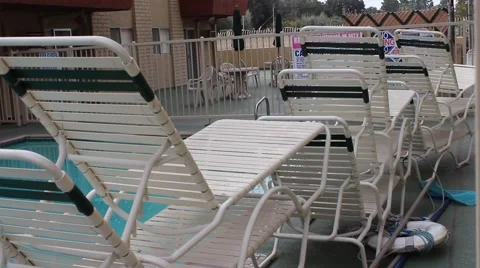 Chairs by Swimming Pool 2 Stock Footage 48381232