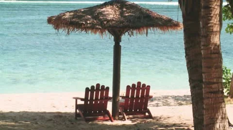 Chairs under a shade Stock Footage 8987779