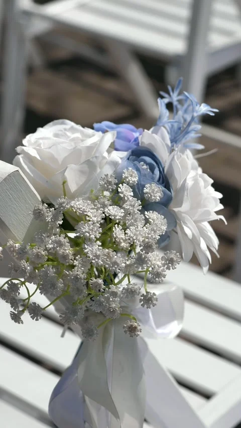 Chairs for the wedding ceremony with decorative elements with fresh flowers Stock Footage 309929853