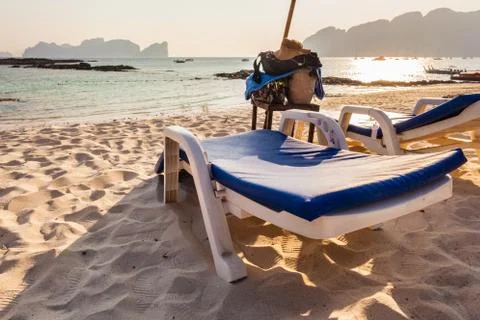 Chaise lounge on the beach Stock Photos