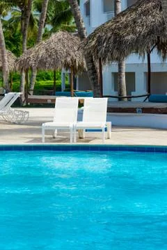 Chaise lounge by the pool Fotos Stock