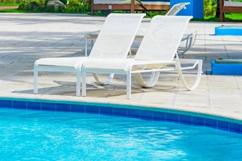 Chaise lounge by the pool Fotos Stock