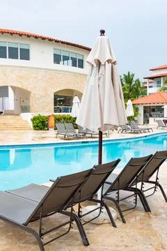 Chaise lounge by the pool Фото