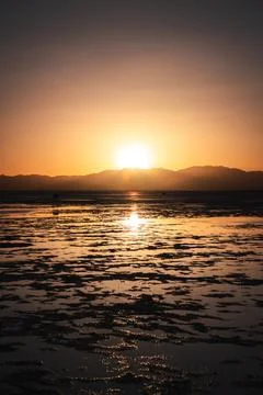 Chaka Salt Flat during sunset, Qinghai province, China Stock Photos