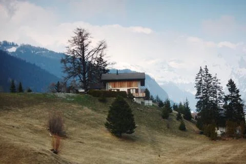 Chalet in mountains Stock Photos