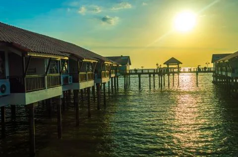 Chalet with sunset Stock Photos