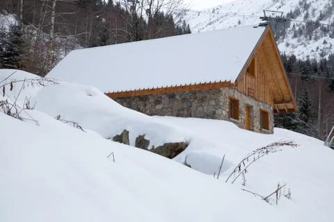 Chalet in winter Stock Photos
