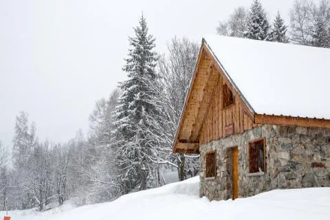 Chalet in winter Stock Photos