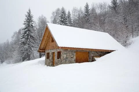 Chalet in winter Stock Photos
