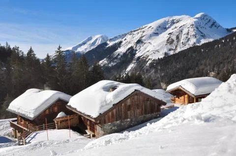 Chalets in the mountains Stock Photos