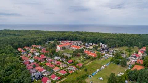 Chalets by the sea in the woods, aerial view Stock Photos