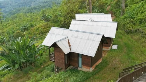 Chalets/Lodges On  Green Hill Stock Footage 106803288