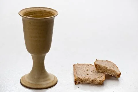 Chalice Of Wine With Bread On The Table Stock Photos