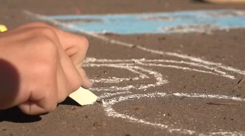 Chalk on asphalt Stock Footage 61750376