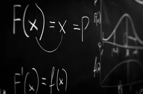 Chalk board with formula Stock Photos
