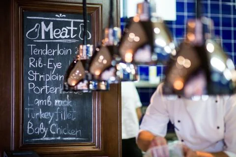 Chalk board menu in a restaurant Stock Photos